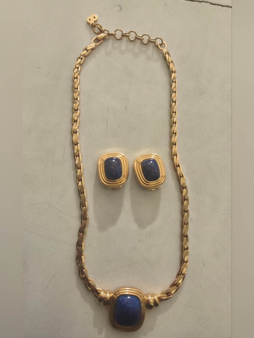Christian Dior Vintage : parure rare unisexe composée de deux bijoux en or avec